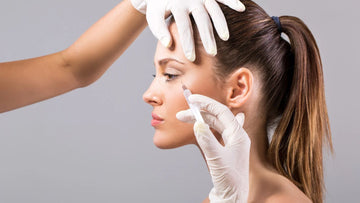 Woman in her 40s smiling naturally, needle-free alternatives to Botox