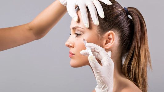 Woman in her 40s smiling naturally, needle-free alternatives to Botox