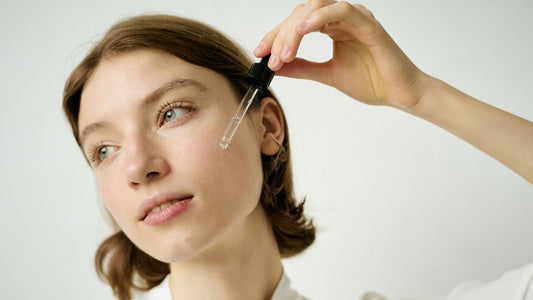 Woman applying a gentle retinol alternative cream around her eyes